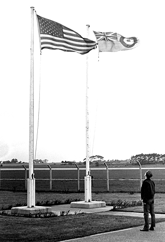 Tom Dick admiring the flags